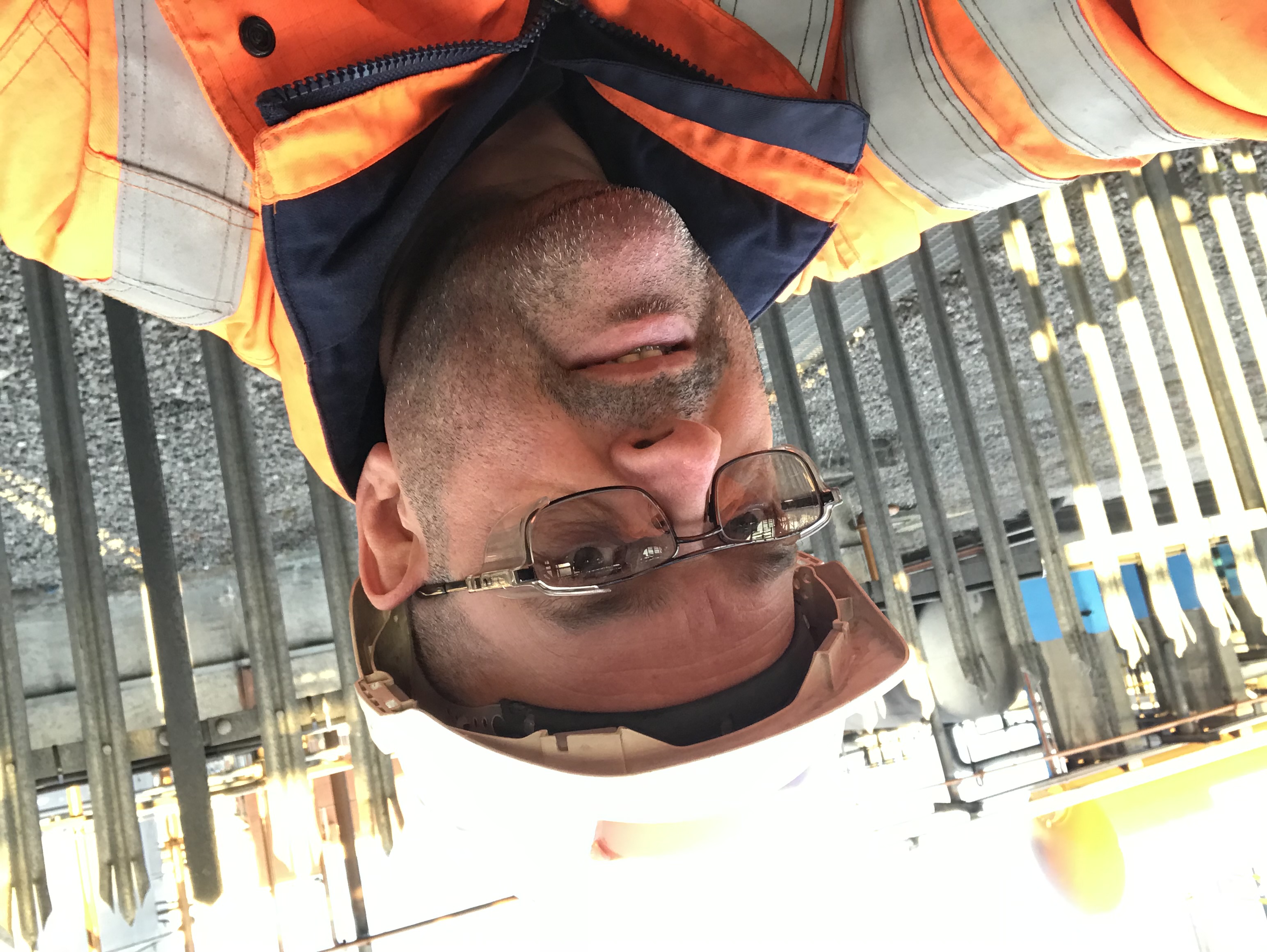 Darren Emery M.Sc. on site in high-visibility workwear